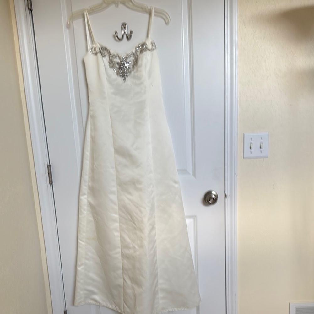 Elegant White Wedding Dress with Silver Accents